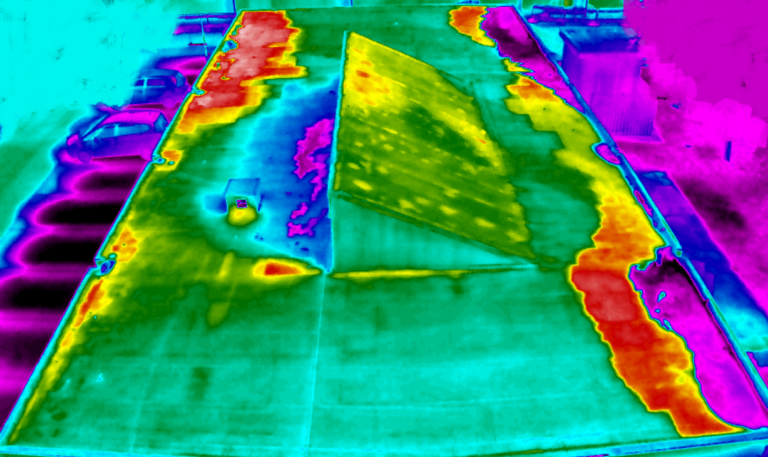 Thermographic image of a rooftop showing where heat escapes